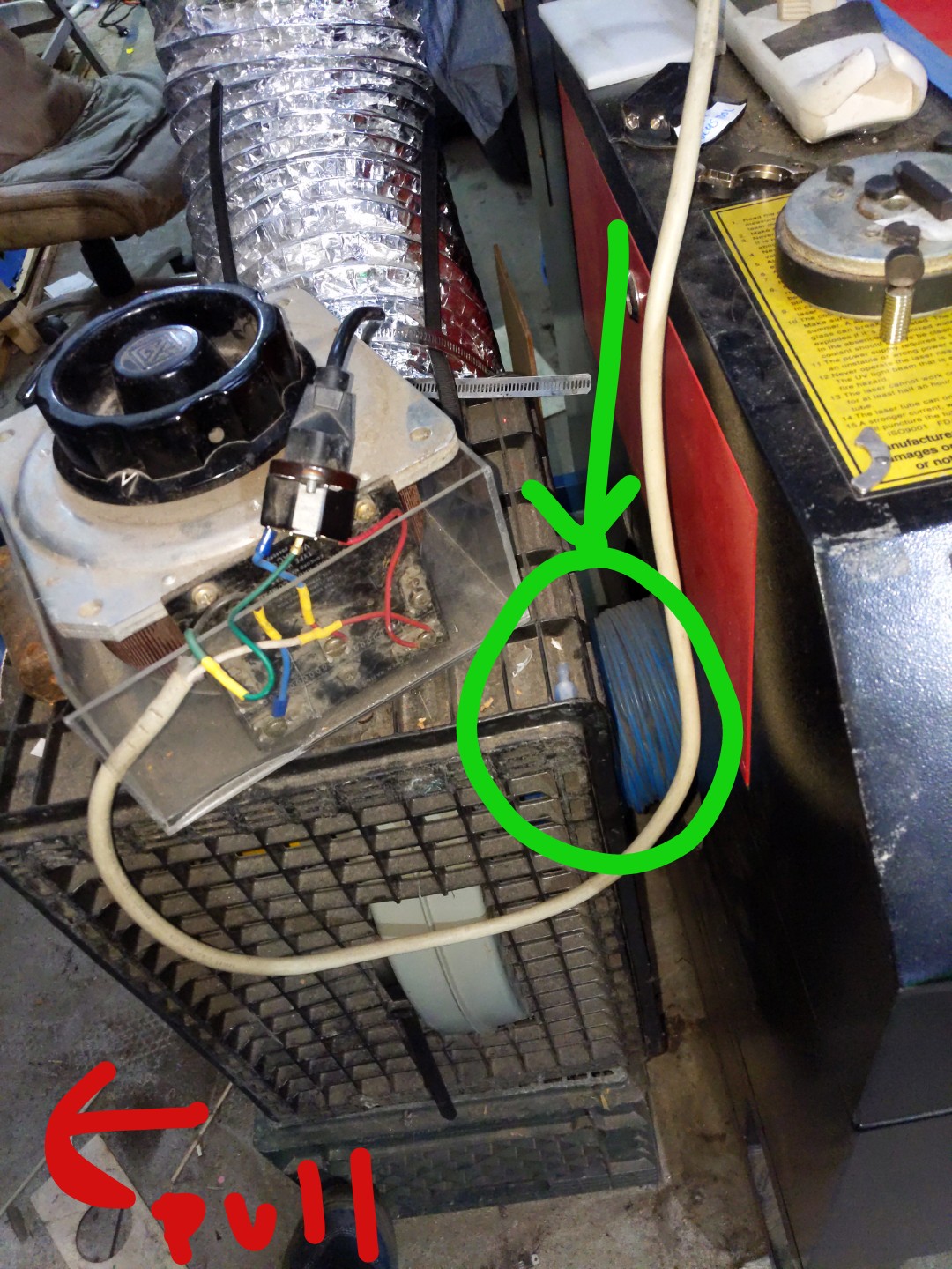 showing where to detach laser exhaust fan