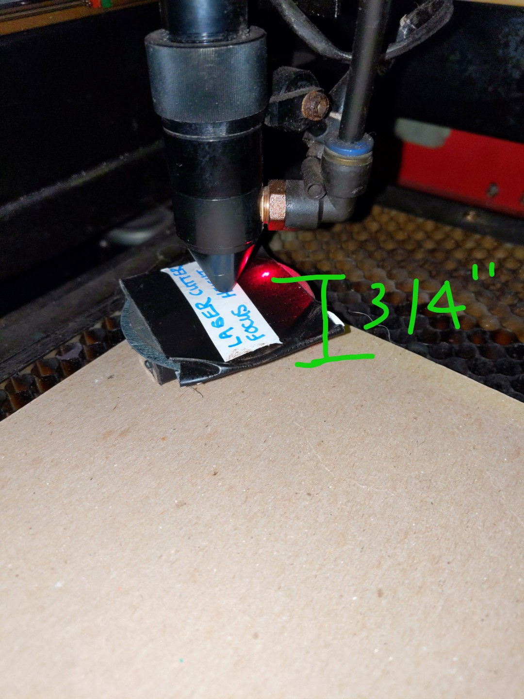 showing correct bed height for laser with tool
